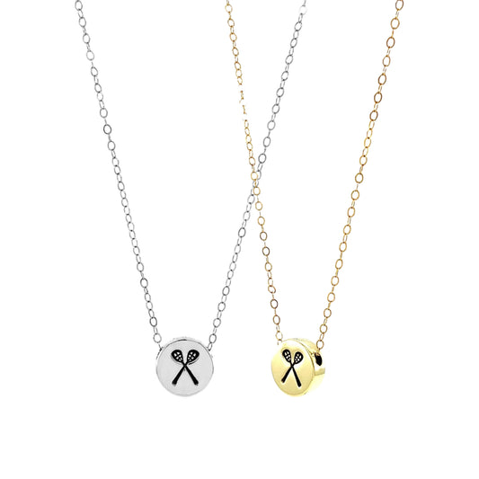 Each lacrosse stick charm is individually hand-forged, adding a personal, artisanal touch to your sports jewelry collection. This necklace features a lacrosse stick sliding charm that sits perfectly on the chain, offering a sleek, sporty look.